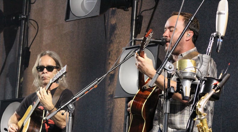 Guitarist Tim Reynolds and Dave Matthews performed the opening song, "Recently," during DMB's 2014 tour stop at Lakewood. Photo: Melissa Ruggieri/AJC
