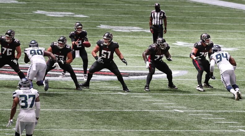 Falcons offensive lineman Kaleb McGary (from left), Chris Lindstrom, Alex Mack, James Carpenter, and Jake Matthews block for Matt Ryan (2) against the Seattle Seahawks Sunday, Sept. 13, 2020, at Mercedes-Benz Stadium in Atlanta. (Curtis Compton / Curtis.Compton@ajc.com)