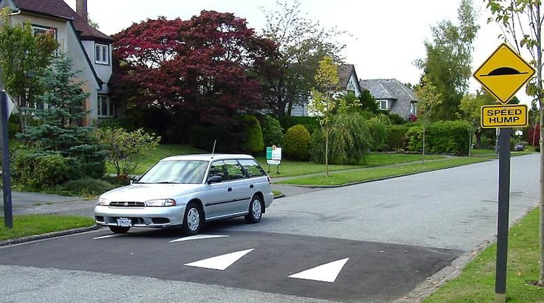 Neighborhoods must meet new requirements and bear all of the cost of installing speed humps in Peachtree City.  AJC FILE