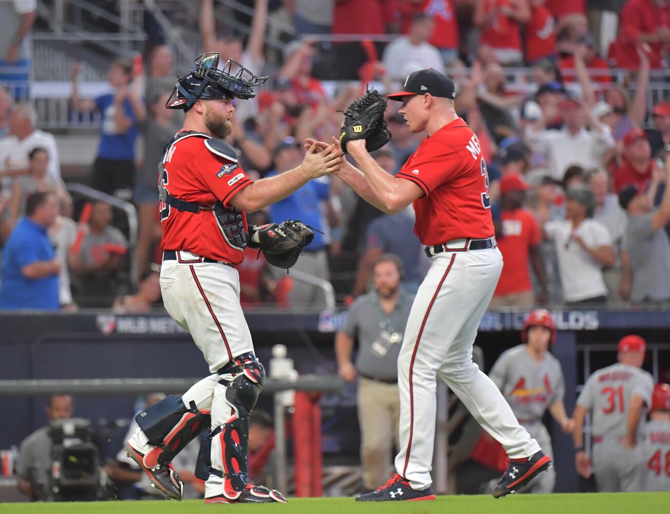 Photos: Braves bounce back, shut out Cardinals in Game 2 of playoffs
