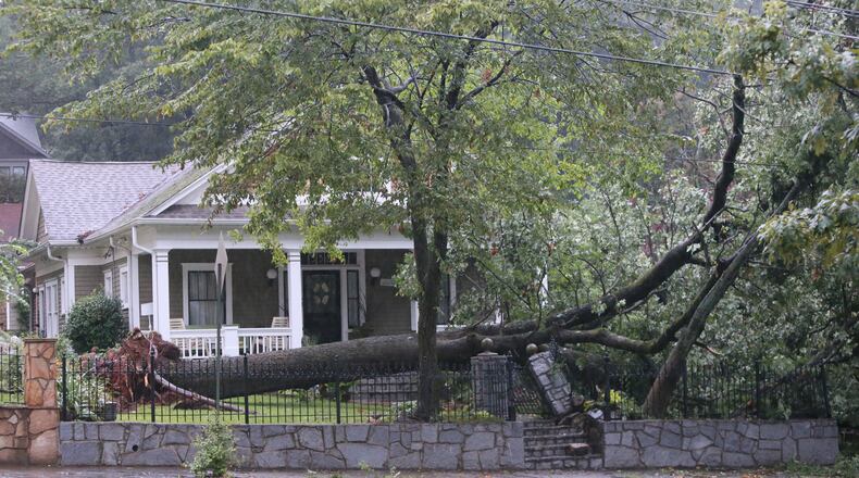 Trees took down power lines in the 500th block of Hill Street SE in Atlanta on Monday, July 21.