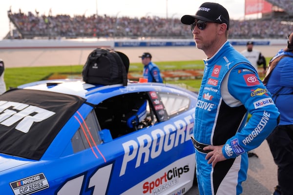 Denny Hamlin waits for the start of a NASCAR Cup Series auto race Sunday, June 1, 2025, in Lebanon, Tenn. (AP Photo/George Walker IV)