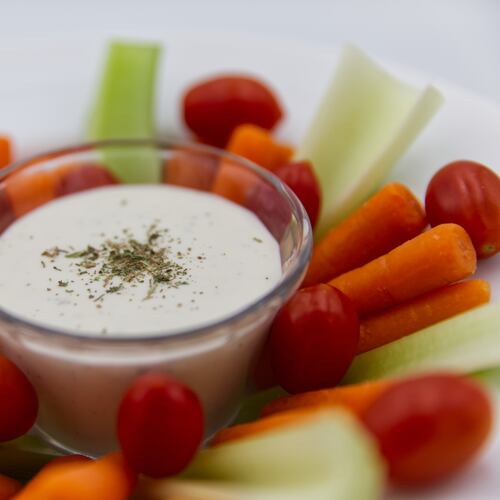 Ranch dressing is served with raw vegetables in Phoenix, Monday, April 13, 2026. (AP Photo/Dario Lopez-Mills)