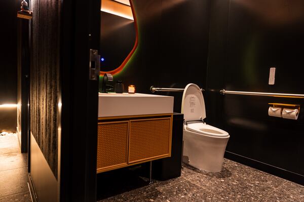 Chef Leonard Yu said he picked out Omakase Table's Woodbridge-brand smart toilets from the Home Depot. (Henri Hollis/AJC)