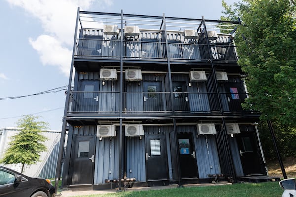 A host of entrepreneurs use a three-story shipping container for their businesses in West Midtown near Inman Yard. (Estela Muñoz/AJC)