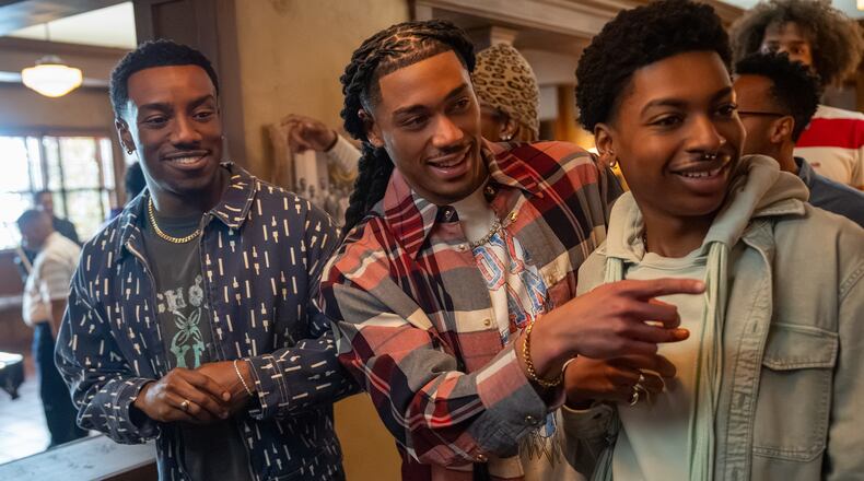 This image released by Netflix shows Chibuikem Uche, from left, Cornell Young IV and Jordan Aaron Hall in a scene from "A Different World." (Quantrell Colbert/Netflix via AP)