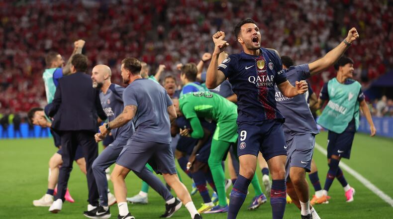 PSG's Goncalo Ramos celebrates after winning the Champions League final soccer match between Paris Saint-Germain and Arsenal in Budapest, Hungary, Saturday, May 30, 2026. AP Photo/Armin Durgut)