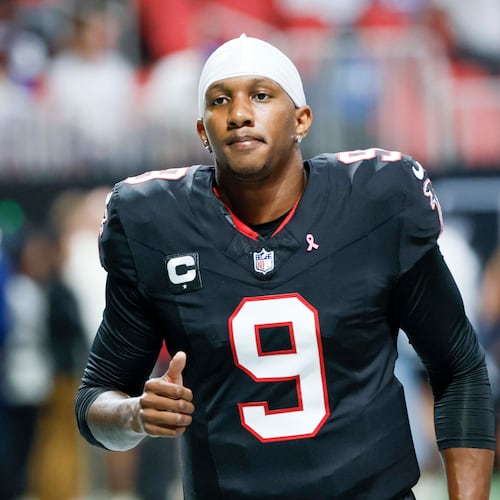 Atlanta Falcons quarterback Michael Penix Jr. is nursing a bone bruise in his left knee but says he is 'feeling good' and preparing to play on Sunday against the Miami Dolphins. (Miguel Martinez/AJC)