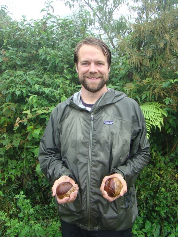 Scott McMahan in 2010 in northern Vietnam with rare Aesculus wangii (buckeye) seeds native to southern China and northern Vietnam.
(Courtesy of Atlanta Botanical Garden)