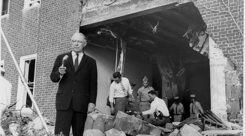 Atlanta Mayor William Hartsfield at the site of the Temple Bombing on Oct. 13, 1958. AJC File photo