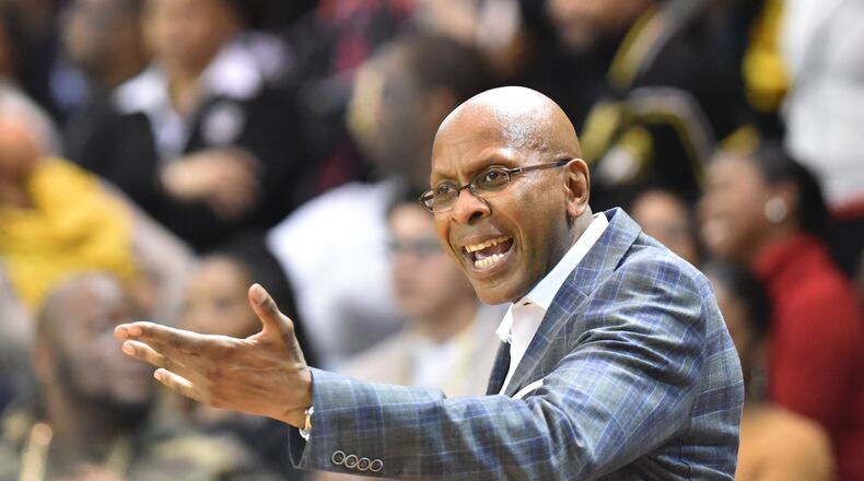 Clark Atlanta head coach Darrell Walker lets his feelings be known during Thursday's triple overtime loss to  Morehouse. (HYOSUB SHIN / HSHIN@AJC.COM)