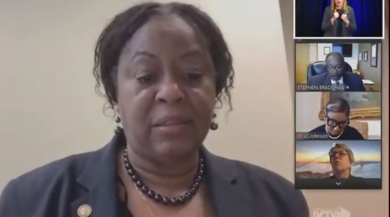 DeKalb County Commissioner Mereda Davis Johnson speaks during Tuesday's commission meeting as other commissioners listen in. SCREENSHOT