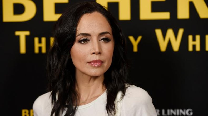 FILE - In this April 5, 2016 file photo, actress Eliza Dushku poses at the premiere of the film "Be Here Now (The Andy Whitfield Story)," at the UTA Theater in Beverly Hills, Calif. Dushku says she was sexually molested at age 12 by a stunt coordinator during production of the 1994 film "True Lies." In a post on her verified Facebook account Saturday, Jan. 13, 2018, Dushku also alleged that Joel Kramer, then 36, caused her to be injured on the set as payback for disclosing the alleged misconduct to a friend. (Photo by Chris Pizzello/Invision/AP, File)