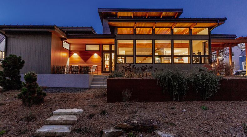 One local homeowner explored teardowns in central Atlanta before settling on prefab construction of a 1,828 square-foot-home at Serenbe. She knew she wanted a small house with a modern aesthetic, a growing trend among homeowners. This image is from the book "Bigger Than Tiny, Smaller Than Average" by Sheri Koones. (Reproduced by permission of Gibbs Smith)