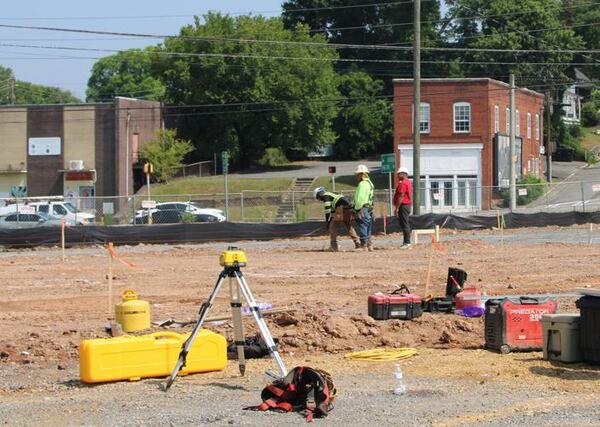 Crews drive stakes and string out the location of the concrete slab for the new Varsity restaurant on Spider Webb Drive. The photos’ background shows parts of North Broad Street that may be part of a redevelopment-corridor TAD aimed at spurring development in the area. (Photo Courtesy of Adam Carey)