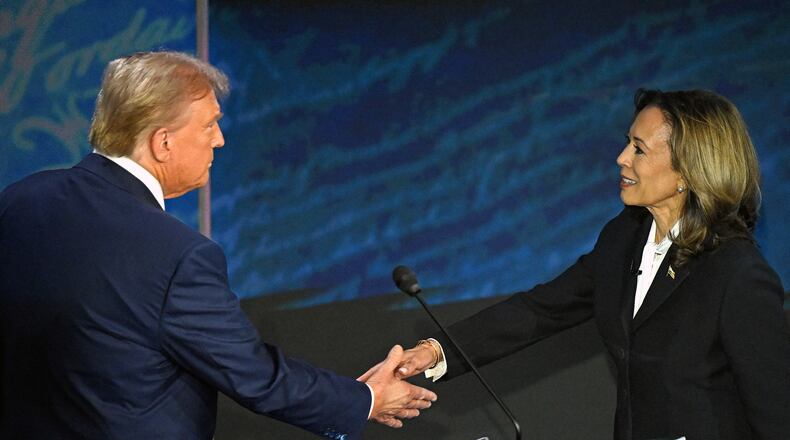 Vice President and Democratic presidential candidate Kamala Harris, right, shakes hands with former President and Republican presidential candidate Donald Trump during a presidential debate at the National Constitution Center in Philadelphia on Sept. 10, 2024. (Saul Loeb/AFP/Getty Images/TNS)