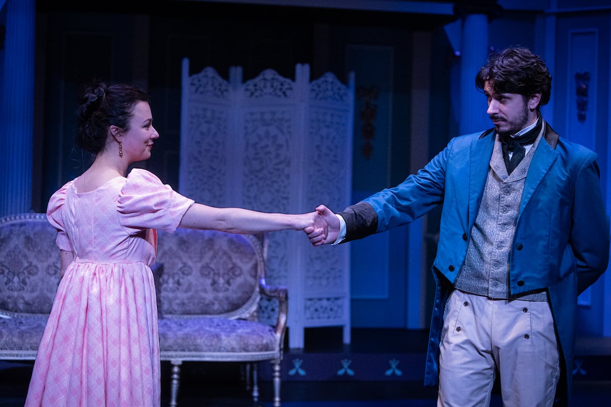 Emma (Claire F. Martin) and Knightley (Luke Robbins) keep their connection at arm’s length. (Courtesy of Jeff Watkins)