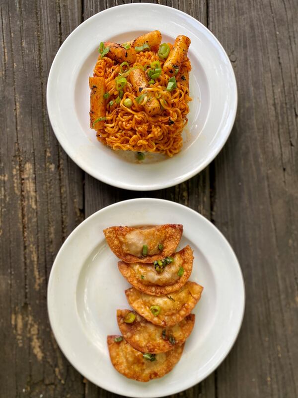 Seoul Chikin serves Korean street snacks, such as this rabokki (pan-fried rice cakes) and mandu (fried dumplings with beef, pork, tofu, glass noodle and cabbage) at its weekly pop-up. Wendell Brock for The Atlanta Journal-Constitution