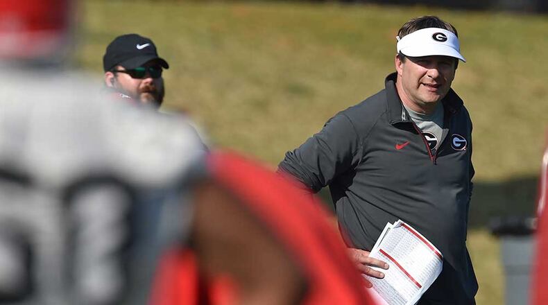 Georgia coach Kirby Smart was more concerned about bigger picture issues than his quarterback as prseason camp opened. (Brant Sanderlin/bsanderlin@ajc.com)