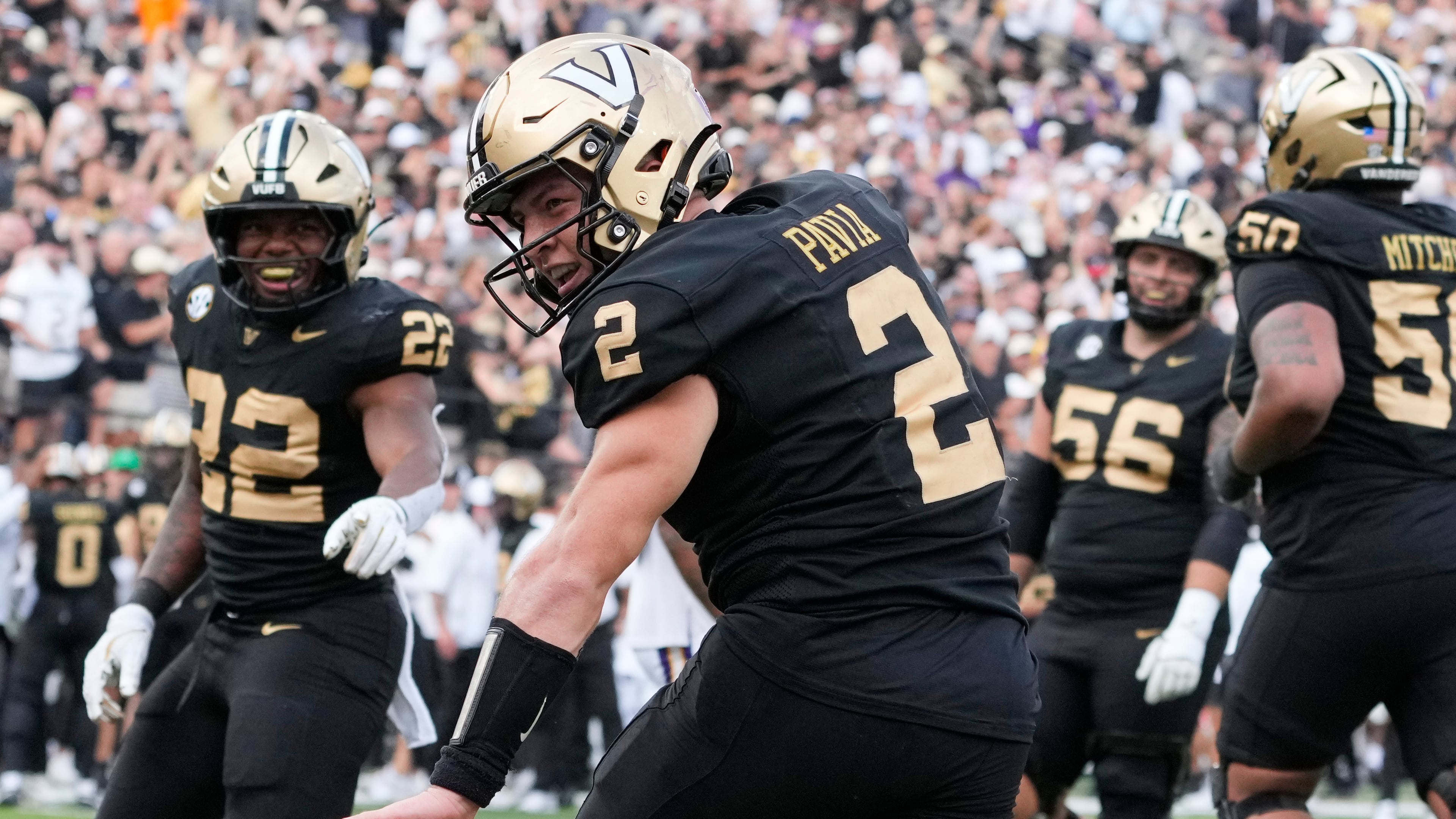 Vanderbilt quarterback Diego Pavia (2) celebrates his touchdown during the second half of an NCAA college football game against LSU, Saturday, Oct. 18, 2025, in Nashville, Tenn. (AP Photo/George Walker IV)