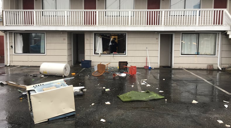A man in Washington state was taken into police custody after authorities said he destroyed a motel room, threatened to kill police officers and threw tools out a window at police. (Photo by Edmonds Police Department)