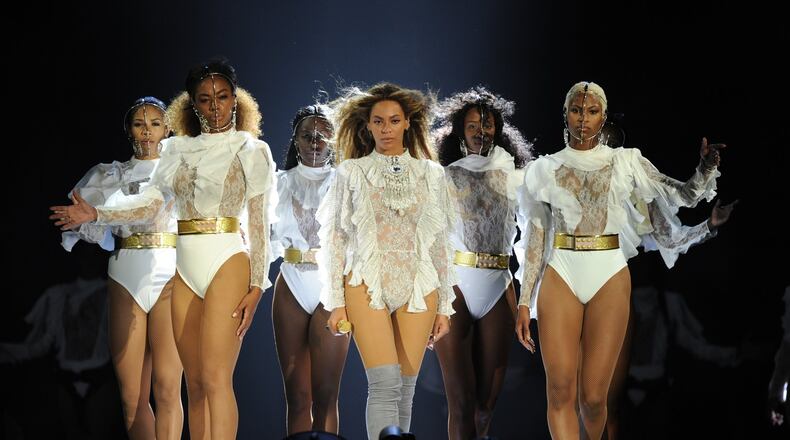 In this handout photo provided by Parkwood Entertainment, Beyonce performs during the opening night of the “Formation World Tour” at Marlins Park on April 27, 2016, in Miami. Her tour comes to the Georgia Dome on May 1. FRANK MICELOTTA / PARKWOOD ENTERTAINMENT VIA GETTY IMAGES