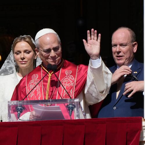 Pope Leo XIV, Princess Charlene of Monaco and Prince Albert II of Monaco appear at the Gallery of Hercules balcony at the Prince's Palace in Monaco-Ville, Monaco, Saturday, March 28, 2026.(AP Photo/Gregorio Borgia)