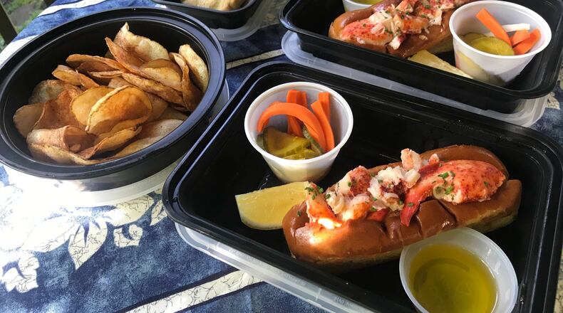 The lobster roll party, available for two ($49) or four ($98), is Drift’s most popular takeout meal. The buttered, toasted rolls are amply filled with meaty chunks of fresh seafood. The dinner also comes with a generous serving of rich lobster bisque (not pictured), crab-flavored potato chips, house pickles and chewy chocolate chip cookies. LIGAYA FIGUERAS / LIGAYA.FIGUERAS@AJC.COM