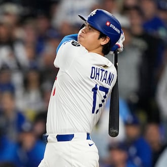 FILE - Los Angeles Dodgers' Shohei Ohtani watches his home run against the Toronto Blue Jays during the seventh inning in Game 3 of baseball's World Series, Monday, Oct. 27, 2025, in Los Angeles. (AP Photo/Brynn Anderson, File)