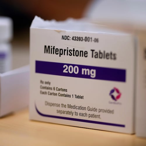 FILE - Mifepristone tablets sit on a table at a Planned Parenthood clinic in Ames, Iowa, July 18, 2024. (AP Photo/Charlie Neibergall, File)