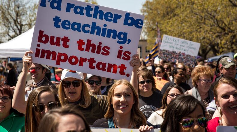 Thousands of Oklahoma teachers gather and march outside the Oklahoma state Capitol, part of a rising teacher revolt in several red states.