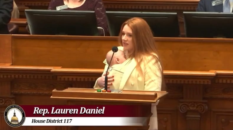 State Rep. Lauren Daniel, R-Locust Grove, with her baby, Zane, speaks at the Georgia House of Represenatives.