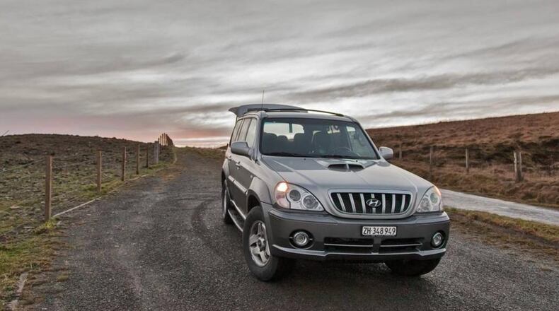 A woman driving a Jeep in Indianapolis was hit by scaffolding blown off its moorings by high winds.
