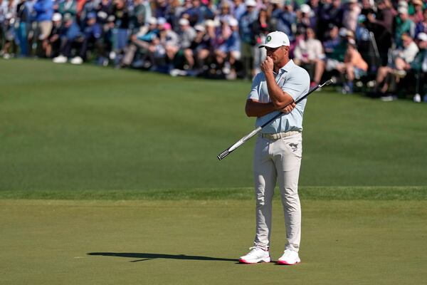 Bryson DeChambeau waits to play on the second hole during the second round at the Masters golf tournament, Friday, April 11, 2025, in Augusta, Ga. (AP Photo/Ashley Landis)