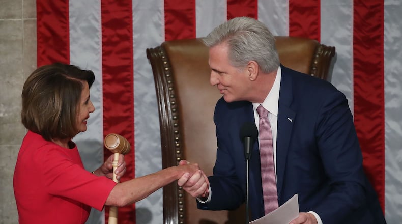 WASHINGTON, DC - JANUARY 03: Outgoing House Majority Leader Kevin McCarthy (R-CA) presents Speaker of the House designate Nancy Pelosi (D-CA) with a gavel before she is sworn in sworn in during the first session of the 116th Congress at the U.S. Capitol January 3, 2019 in Washington, DC. Under the cloud of a partial federal government shutdown, Pelosi will reclaim her former title as Speaker of the House and her fellow Democrats will take control of the House of Representatives for the second time in eight years.  (Photo by Mark Wilson/Getty Images)