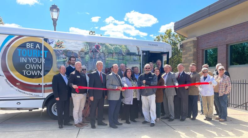 This recent ribbon cutting was held at the Cherokee County Administrative Offices to introduce the first propane-powered public transit buses in Georgia. (Courtesy of Cherokee County)