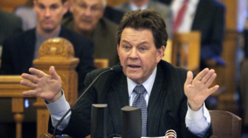 Arthur Laffer, the former Reagan Administration economist who advised Gov. Sam Brownback on his tax plan, testifies before the Kansas House Tax committee at the statehouse, Thursday, Jan. 19, 2012 in Topeka, Kan .(AP Photo/Topeka Capital-Journal, Thad Allton) This man has a used cocktail napkin that he'd like to sell you: Arthur Laffer testifies in 2012 to the Kansas Legislature about the economic marvels that his plan was going to produce. (AP)
