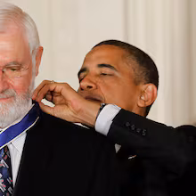 President Barack Obama (back) awards the Medal of Freedom to Dr. William Foege, former director of the Centers for Disease Control and Prevention, during a 2012 ceremony in the White House in Washington. Foege helped lead the effort to eradicate smallpox. (Charles Dharapak/AP 2012)