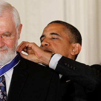 President Barack Obama (back) awards the Medal of Freedom to Dr. William Foege, former director of the Centers for Disease Control and Prevention, during a 2012 ceremony in the White House in Washington. Foege helped lead the effort to eradicate smallpox. (Charles Dharapak/AP 2012)