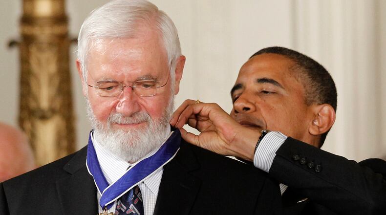 FILE - President Barack Obama awards the Medal of Freedom to Dr. William Foege, former director of the Centers for Disease Control and Prevention, who helped lead the effort to eradicate smallpox, during a ceremony in the East Room of the White House in Washington, Tuesday, May 29, 2012. (AP Photo/Charles Dharapak, File)