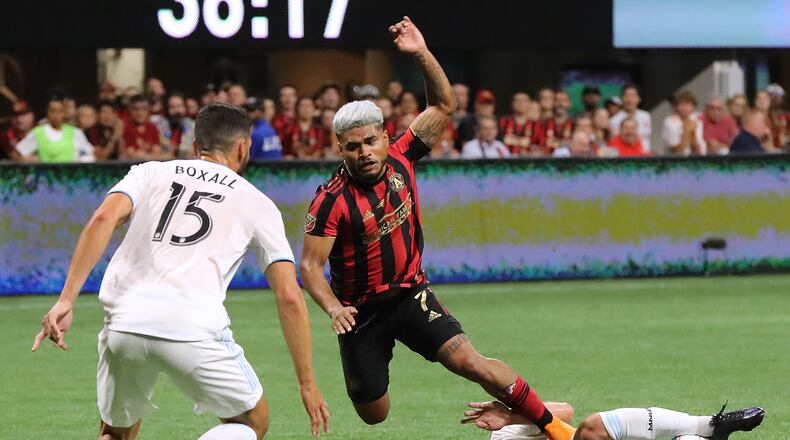 August 27, 2019 Atlanta: Atlanta United forward Josef Martinez collides with Minnesota United defender Chase Gasper in the final for the U.S. Open Cup on Tuesday, August 27, 2019, in Atlanta. Curtis Compton/ccompton@ajc.com