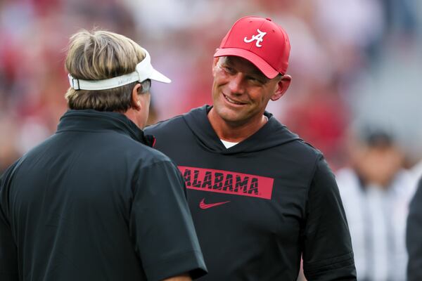Alabama head coach Kalen DeBoer talks with Georgia head coach Kirby Smart before their game at Bryant-Denny Stadium, Saturday, Sept. 28, 2024, in Tuscaloosa, Ala. Jason Getz/AJC

