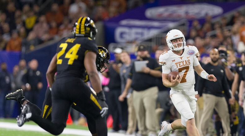 Texas quarterback Shane Buechele (7) scrambles past Missouri linebacker Terez Hall (24) in the first half of the Texas Bowl NCAA college football game in Houston, Wednesday, Dec. 27, 2017. (Stephen Spillman / for American-Statesman)