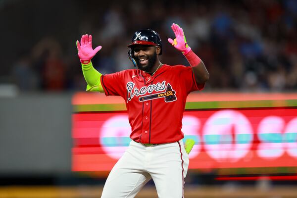 Atlanta Braves’ Michael Harris II reacts after hitting a three-run double during the seventh inning against the Texas Rangers at Truist Park, Friday, July 17, 2026, in Atlanta. The Braves won 15-1. (Jason Getz/AJC)