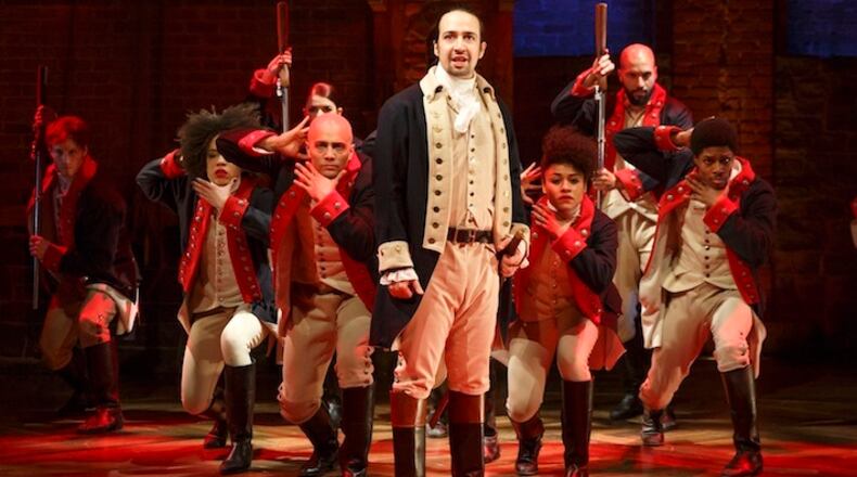 This image released by The Public Theater shows Lin-Manuel Miranda, foreground, with the cast during a performance of "Hamilton," in New York. "Hamilton," the hip-hop stage biography of Alexander Hamilton won the 2016 Pulitzer Prize for drama on Monday, April 18, 2016. (Joan Marcus/The Public Theater via AP)