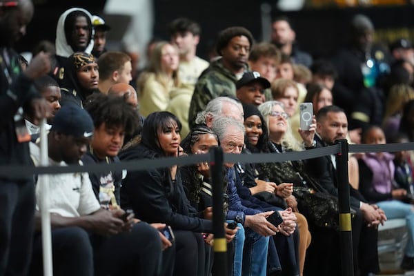Guests look on as players take part in the 40-yard dash during Colorado's NFL football pro day Friday, April 4, 2025, in Boulder, Colo. (AP Photo/David Zalubowski)