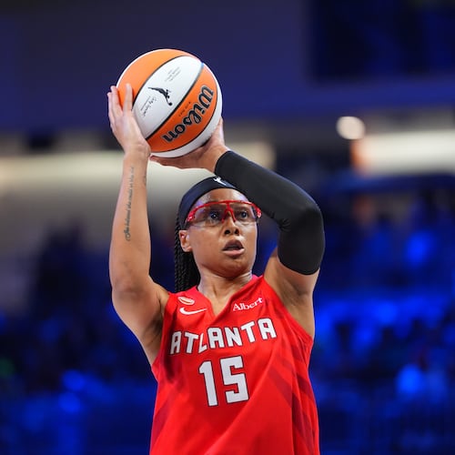 Dream guard Allisha Gray shoots a free throw during the first half of a WNBA basketball game against the Dallas Wings in Arlington, Texas, Tuesday, May 12, 2026. (AP Photo/LM Otero)