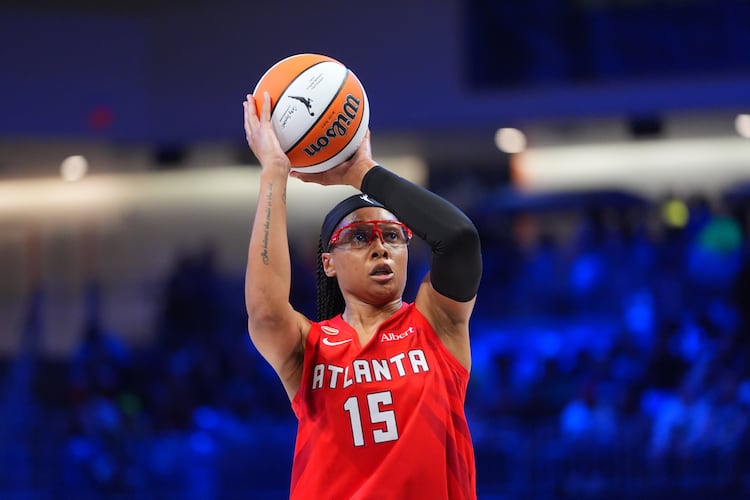 Dream guard Allisha Gray shoots a free throw during the first half of a WNBA basketball game against the Dallas Wings in Arlington, Texas, Tuesday, May 12, 2026. (AP Photo/LM Otero)