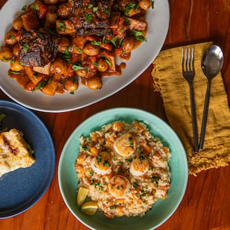 These holiday recipes make delicious, festive meals with minimal leftovers. Clockwise from top: braised short ribs with root vegetables, seared scallops with butternut squash risotto and spinach and mushroom lasagna for two. (Aaliyah Man for the AJC/food styling by Kate Williams)
