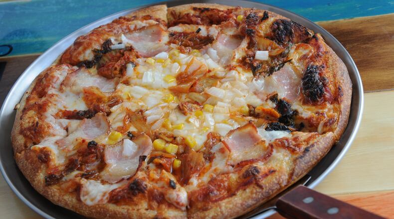 160713- SUWANEE- GA- Ligaya Figueras restaurant review of BonBon in Gwinnett. FOOD: Kimchee Pizza- applewood smoked bacon, kimchee, garlic, corn, onions and mozzarella. (BECKY STEIN PHOTOGRAPHY)